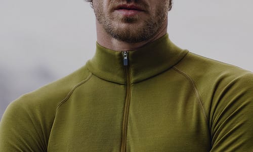 Man wearing icebreaker merino base layer thermal top