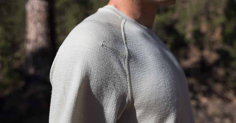 man wearing icebreaker waffle 100% merino t-shirt