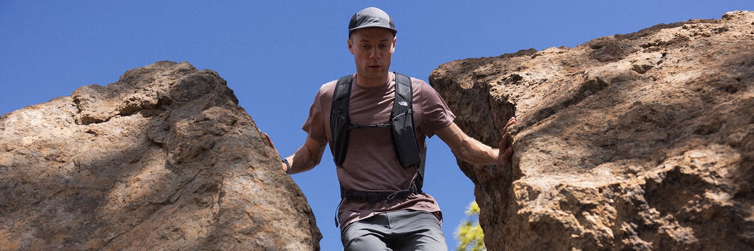 Man hiking an icebreaker sphere cool-lite merino t-shirt