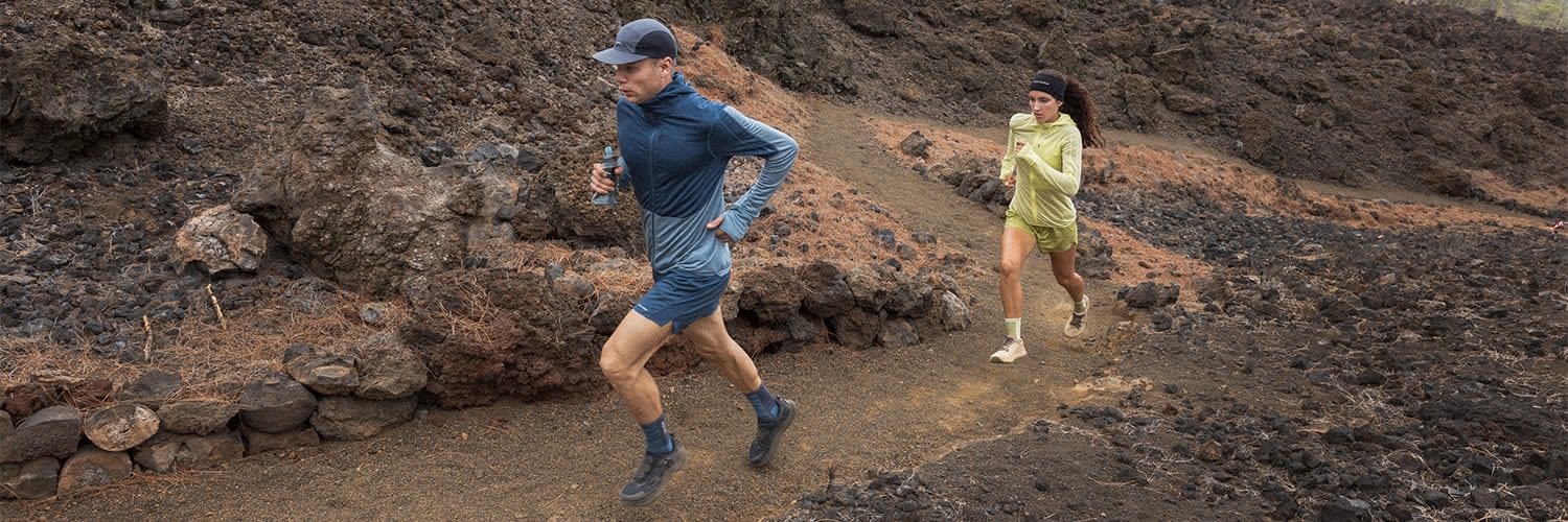Man running wearing icebreaker zoneknit merino shorts and merino top