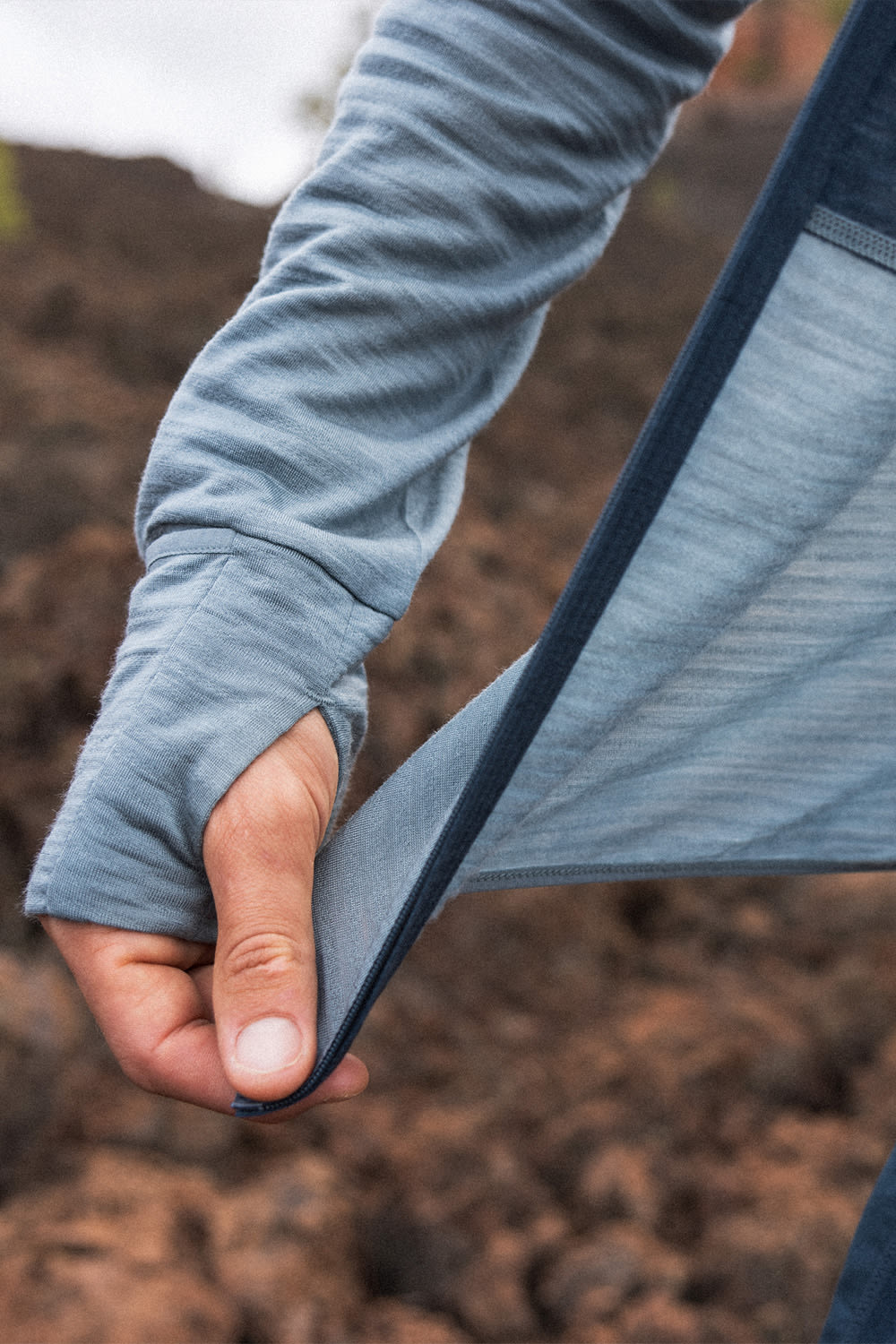 A close up of an icebreaker t-shirt and mid layer. 