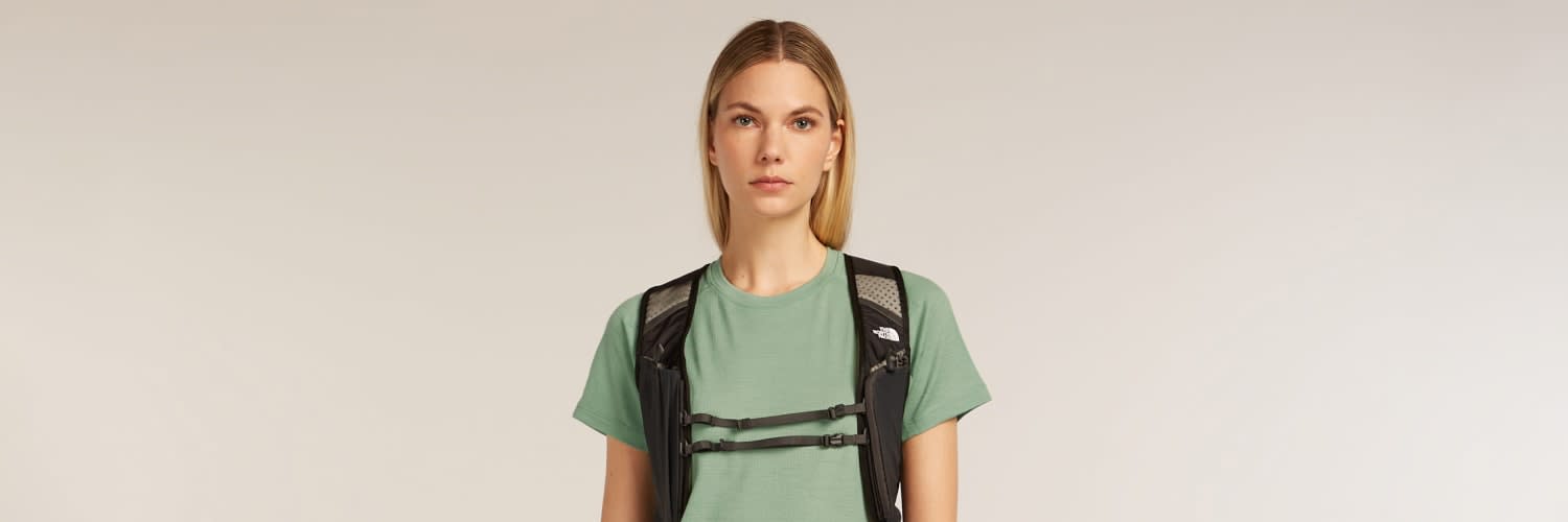 Woman hiking wearing icebreaker Tech lite merino t-shirt