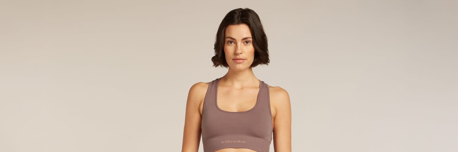 Woman wearing an icebreaker merino yoga bra