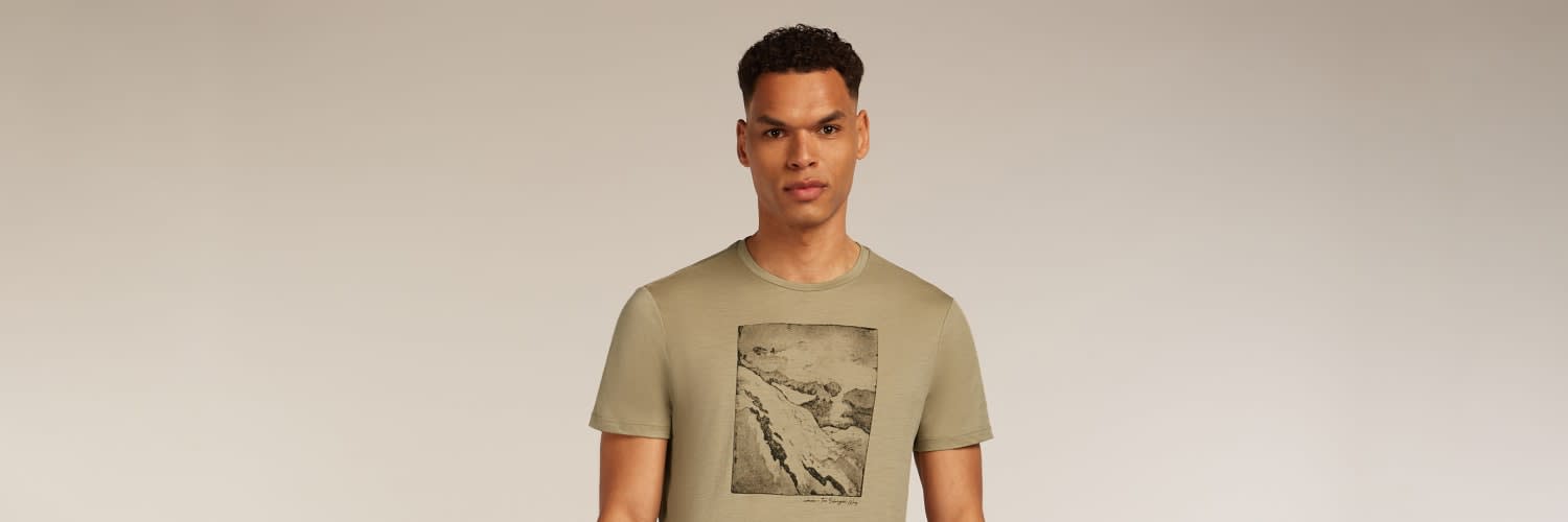Man wearing icebreaker tech lite graphic print merino t-shirt