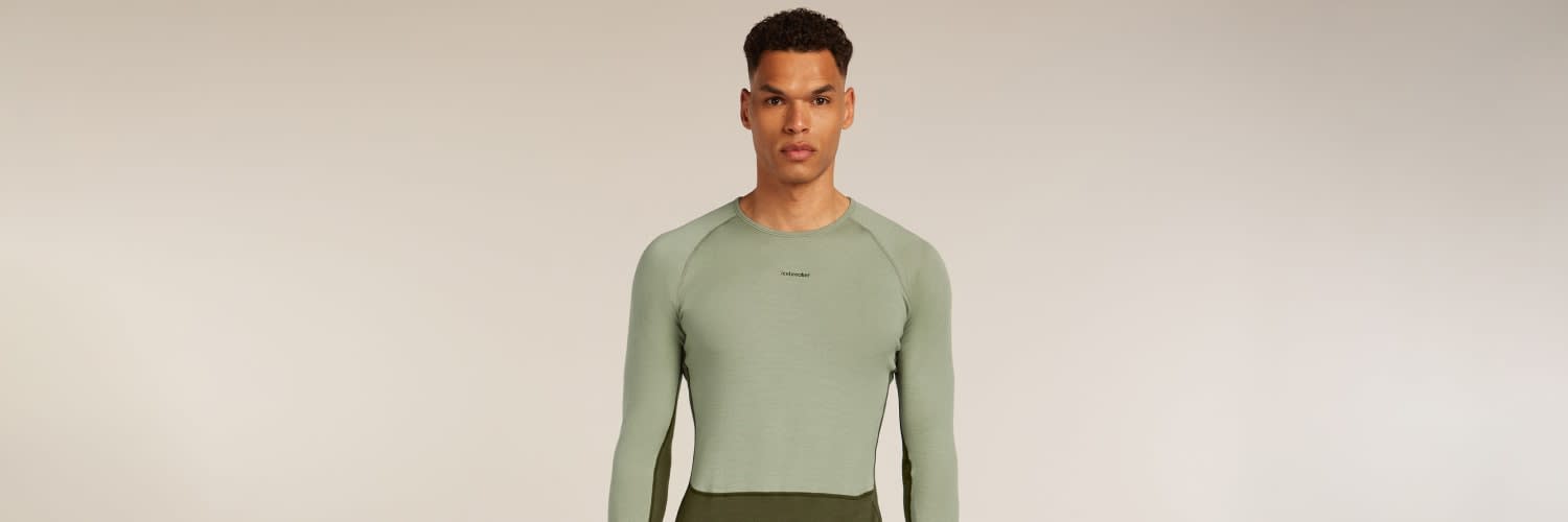 Man wearing icebreaker zoneknit base layer merino thermal top