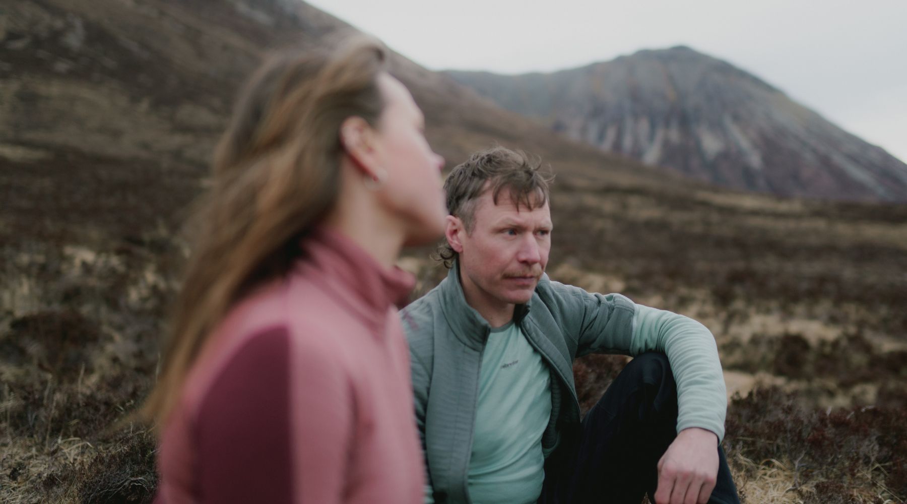 two people skiing in merino wool