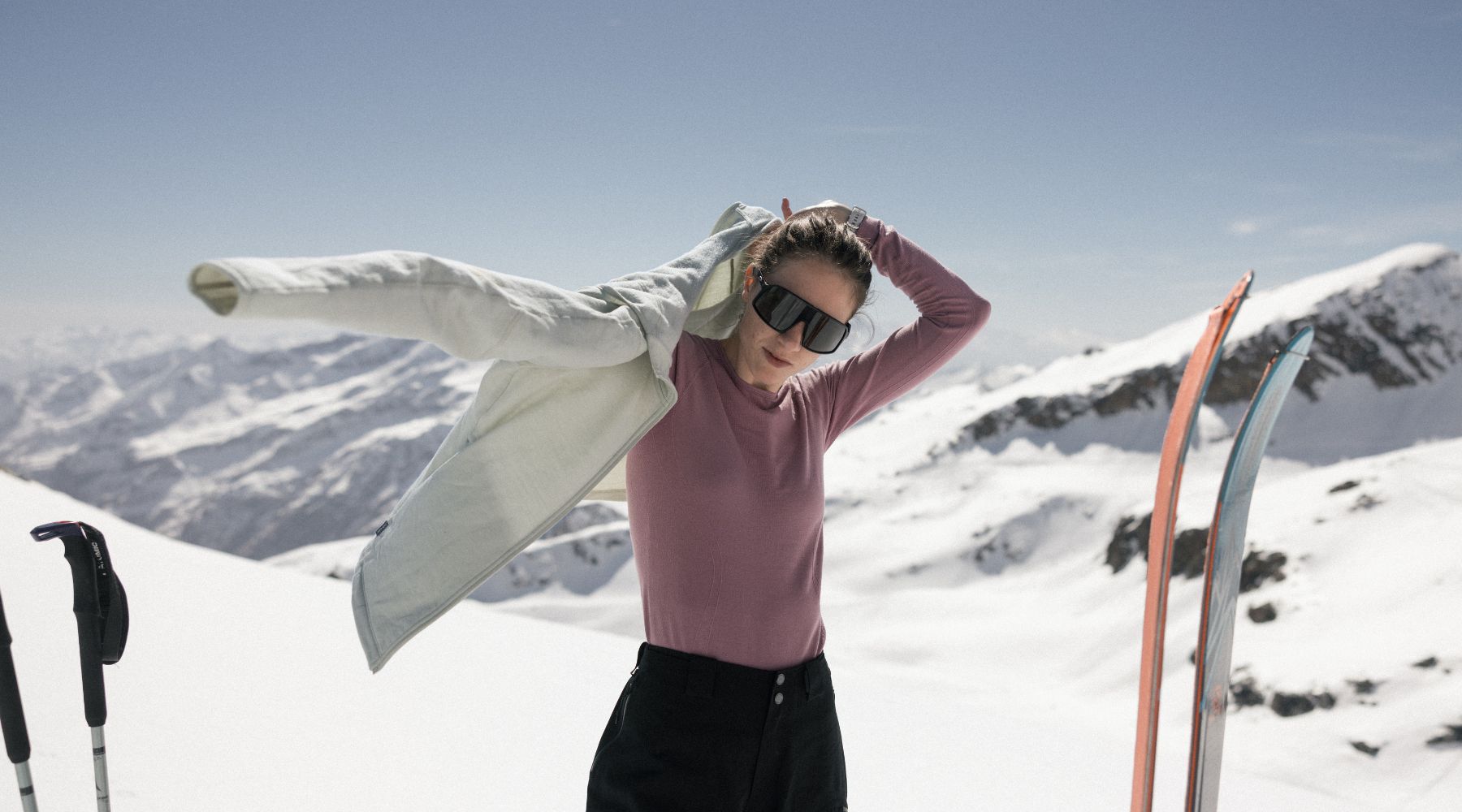 a women and a man in merino in the mountains