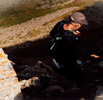 Mikey Kratzer running in merino, Chamonix